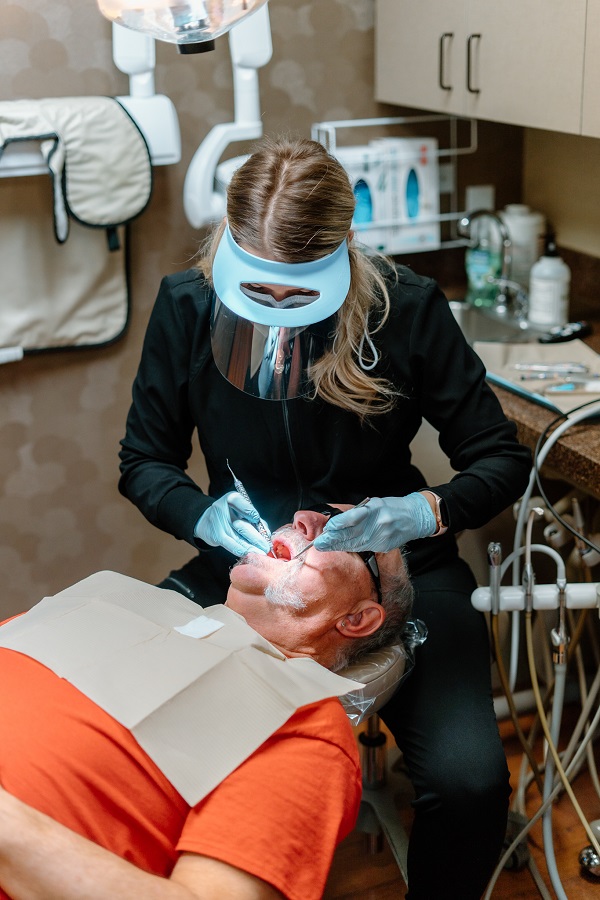 person receiving a dental checkup