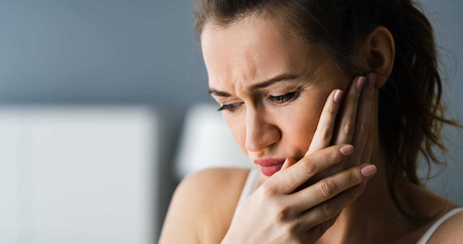 Person experiencing tooth pain. Accidents happen, and knowing what to do when one occurs can mean the difference between saving and losing a tooth.